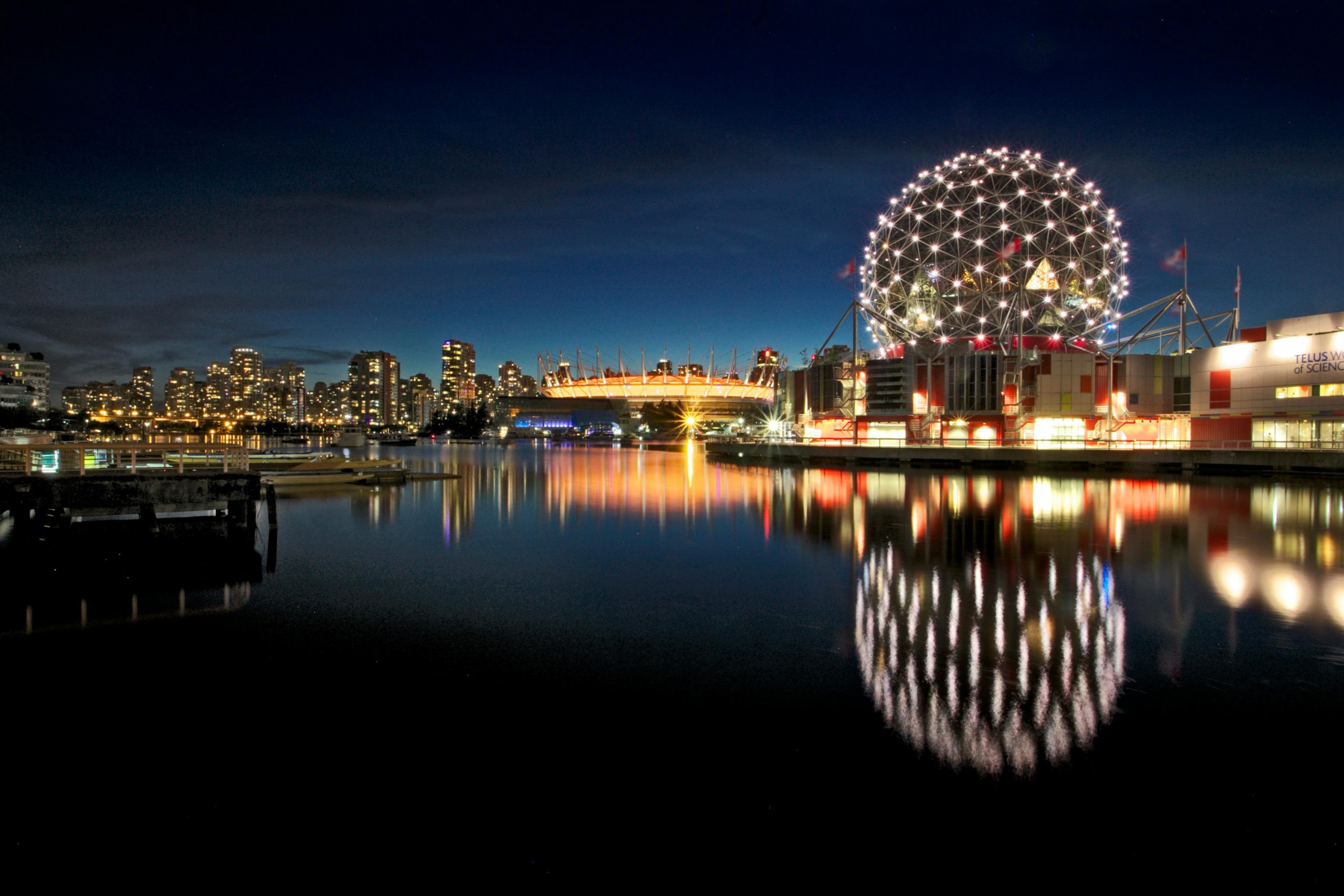 Canada skyline and office buildings representing job opportunities with visa sponsorship for international workers.